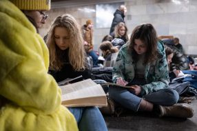 Teachers and students conduct lessons in the subway during a rocket attack