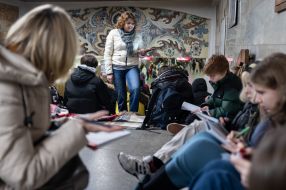 Teachers and students conduct lessons in the subway during a rocket attack