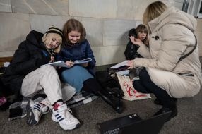 Teachers and students conduct lessons in the subway during a rocket attack