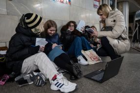 Teachers and students conduct lessons in the subway during a rocket attack