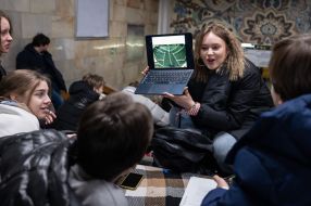 Teachers and students conduct lessons in the subway during a rocket attack
