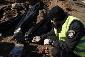 Exhumation of the bodies of three civilians in Borodianka