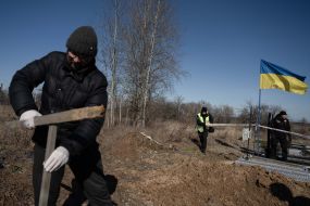 Exhumation of the bodies of three civilians in Borodianka