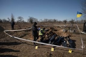 Exhumation of the bodies of three civilians in Borodianka