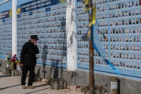 Man near the Wall of Remembrance of those who died for Ukraine
