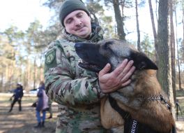 Dog breeder with a dog