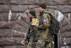 Military servicemen with cakes