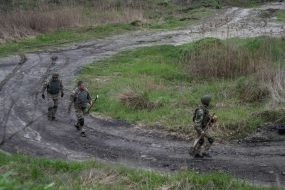 Sappers during the planned destruction of explosive ammunition