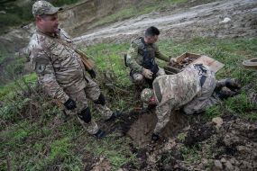 Sappers during the planned destruction of explosive ammunition