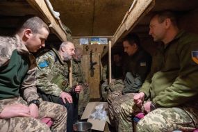 Chaplain at the positions of his military unit
