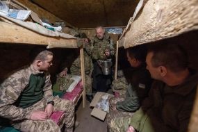 Chaplain at the positions of his military unit