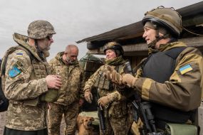 Chaplain at the positions of his military unit