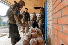 Military chaplain conducts the ceremony of consecration of Easter cakes