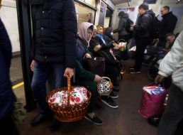 People with Easter baskets in the subway