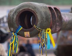 Yellow and blue ribbons on destroyed Russian military equipment