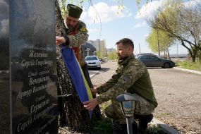 The chaplain held a memorial service for the soldiers of his military unit