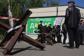Law enforcement officers check documents at the entrance to Kulikovo field