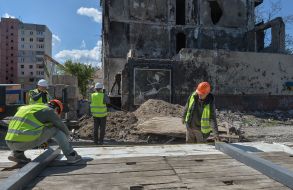 A piece of wall with graffiti by Banksy from a destroyed house in Irpen