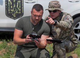 The navigator and the operator control the flight of the drone