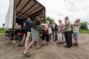 Local residents receive humanitarian aid in the Kharkiv region
