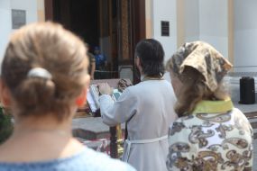 Believers in the damaged Transfiguration Cathedral