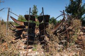 Burnt library shelves of the library destroyed by the Russian occupiers in the village of Pidgaine, Kyiv region
