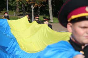 School cadets of Lyceum 23 "Cadet Corps" holding the flag of Ukraine