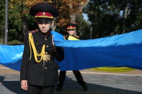 School cadets of Lyceum 23 "Cadet Corps" holding the flag of Ukraine