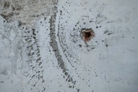 Damage to the wall of the Church of the Exaltation of the Cross in the city of Izyum, Kharkiv region