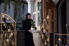 Believer near the chapel