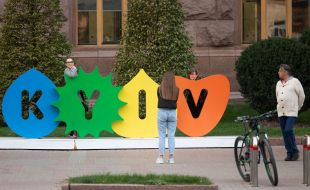 People take pictures near the installation "Kyiv"