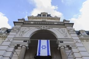 An Israeli flag was hung near Lviv City Hall as a sign of solidarity