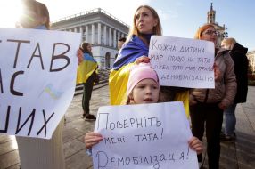A girl with a poster