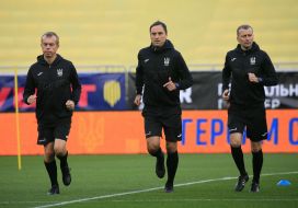 Referees before the start of the match