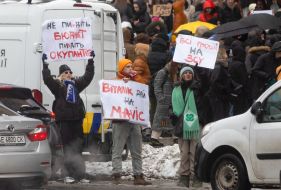 Participants of the action with posters near the KMDA ​