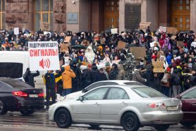 Participants of the action with posters near the KMDA ​