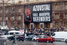 Participants of the action with posters near the KMDA ​