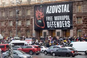 Participants of the action with posters near the KMDA ​