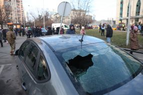 A car damaged as a result of a missile strike
