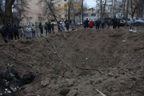 A tear from a fragment of a Russian rocket in the yard of a residential building in Vyshnevo