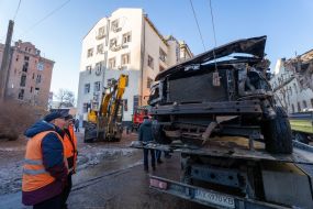 Utility workers eliminate the consequences of a missile strike