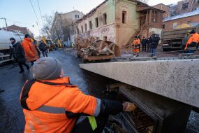 Utility workers eliminate the consequences of a missile strike