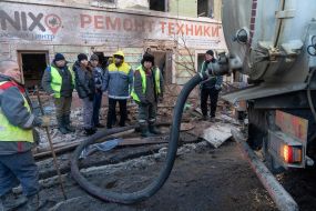 Utility workers eliminate the consequences of a missile strike