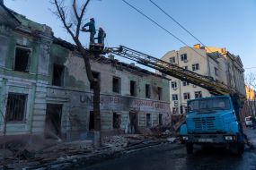 Utility workers eliminate the consequences of a missile strike