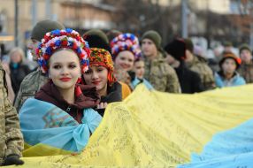 The largest National flag with wishes from children and military