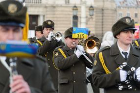 The largest National flag with wishes from children and military