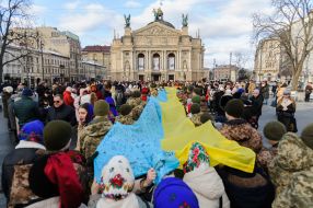 The largest National flag with wishes from children and military
