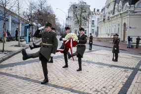 Laying flowers at the memorial wall of those who died in the Russian-Ukrainian war