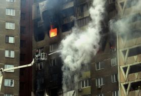 Rescuers are extinguishing the fire