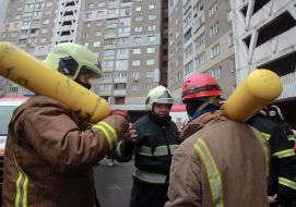 Rescuers during the liquidation of the consequences of a rocket attack